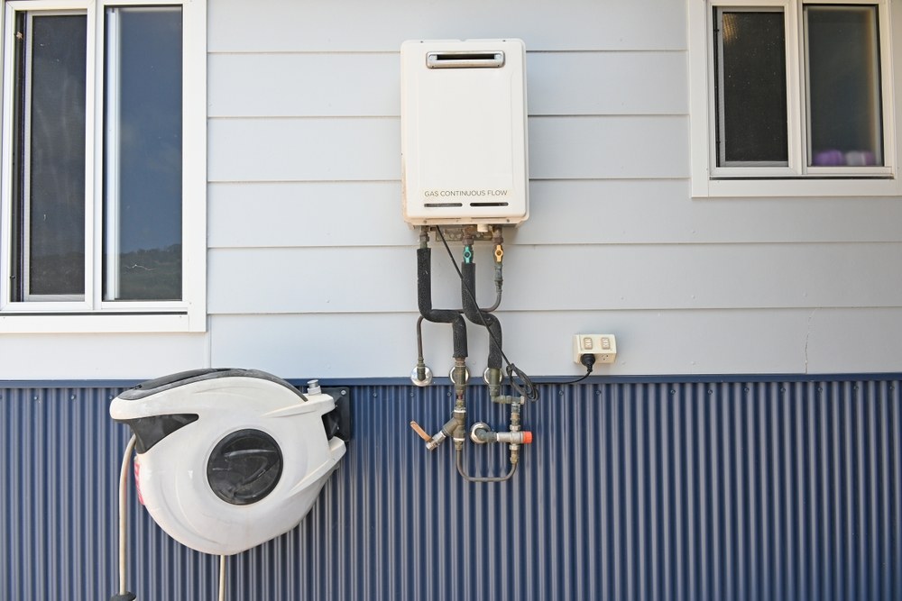 How Tankless Water Heater Installation Saves Space and Lowers Utility Bills